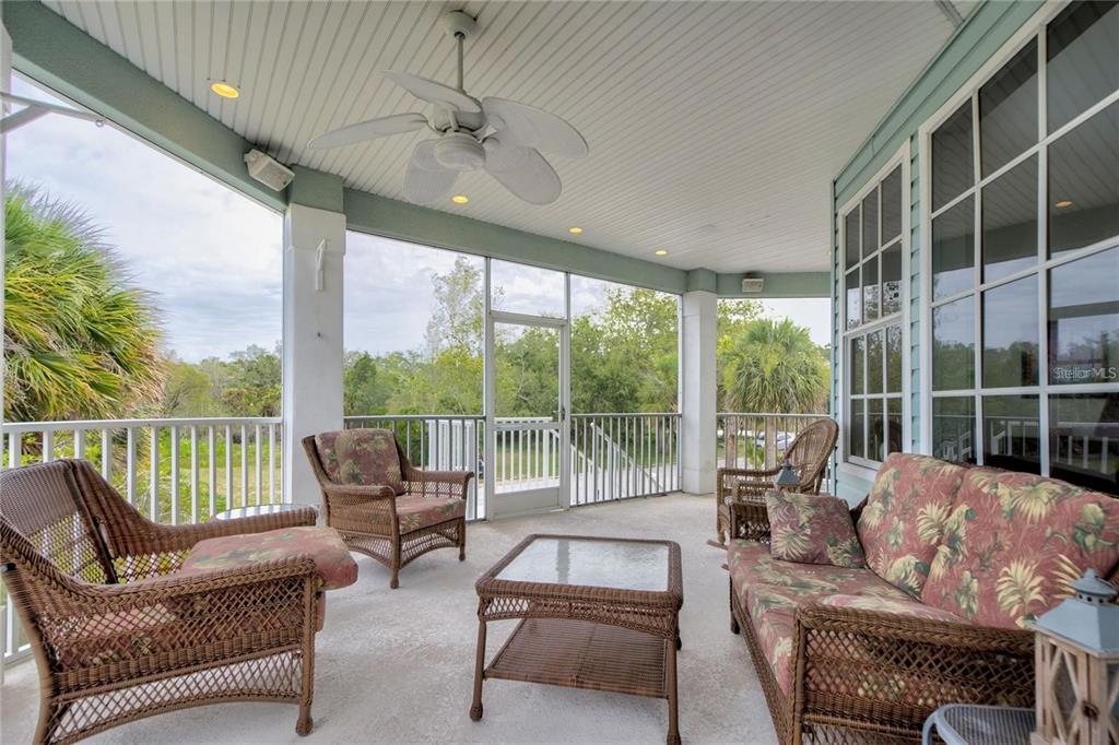 7352 Gulf Way Hudson, FL 34667 - Photo 31 of 69 a living room with furniture and a large window