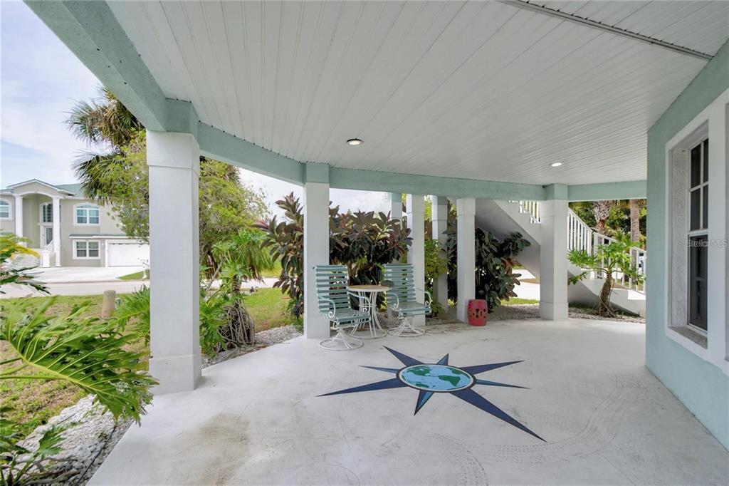 7352 Gulf Way Hudson, FL 34667 - Photo 33 of 69 a living room with furniture and garden view