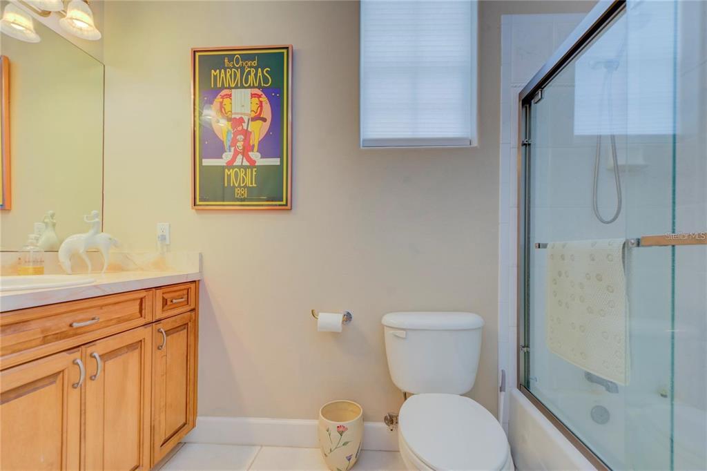 7352 Gulf Way Hudson, FL 34667 - Photo 36 of 69 a bathroom with a toilet sink and mirror