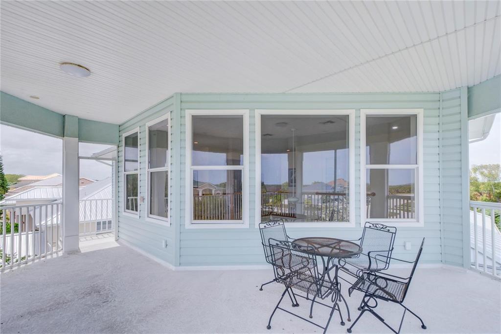 7352 Gulf Way Hudson, FL 34667 - Photo 44 of 69 a view of a dining room with furniture and windows