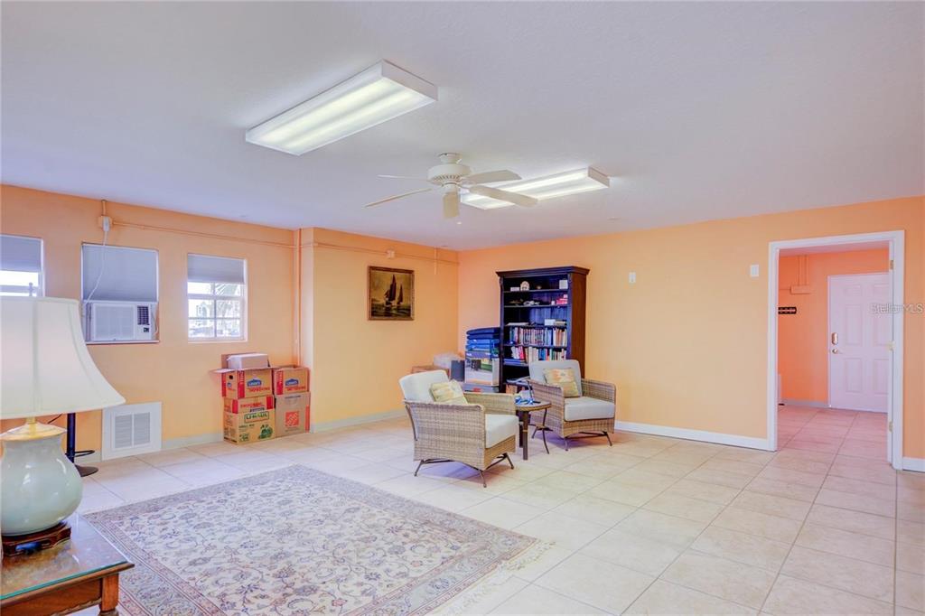 7352 Gulf Way Hudson, FL 34667 - Photo 49 of 69 a living room with furniture and a wooden floor