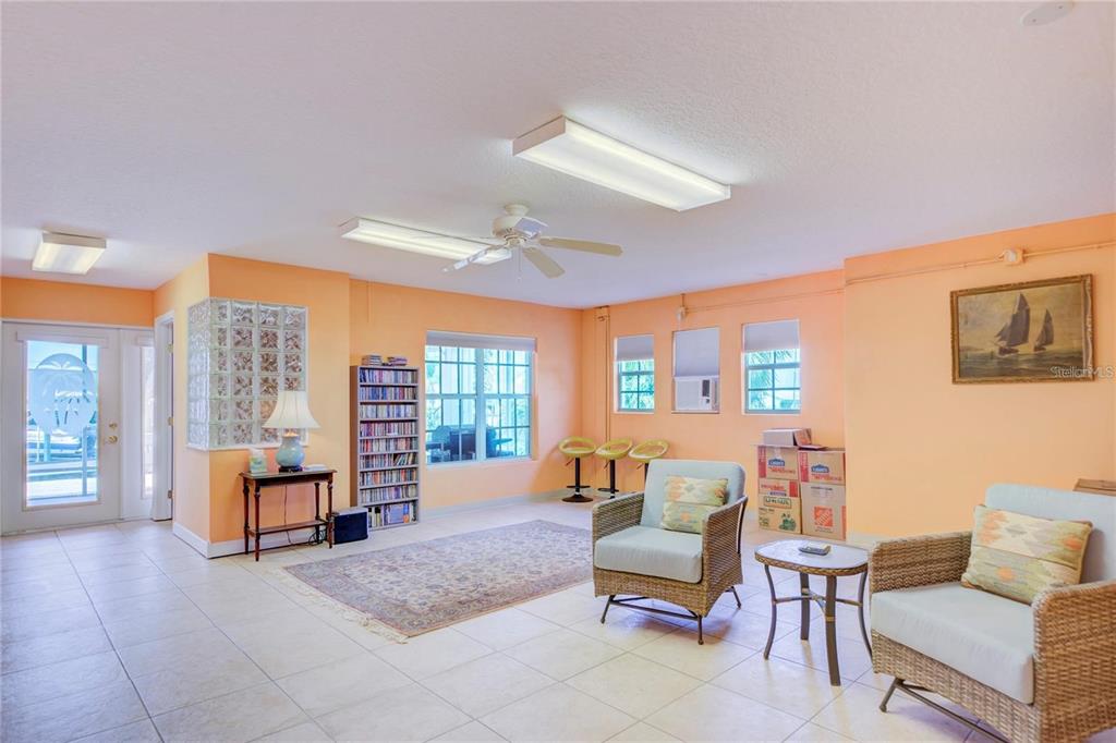 7352 Gulf Way Hudson, FL 34667 - Photo 50 of 69 a living room with furniture and a large window