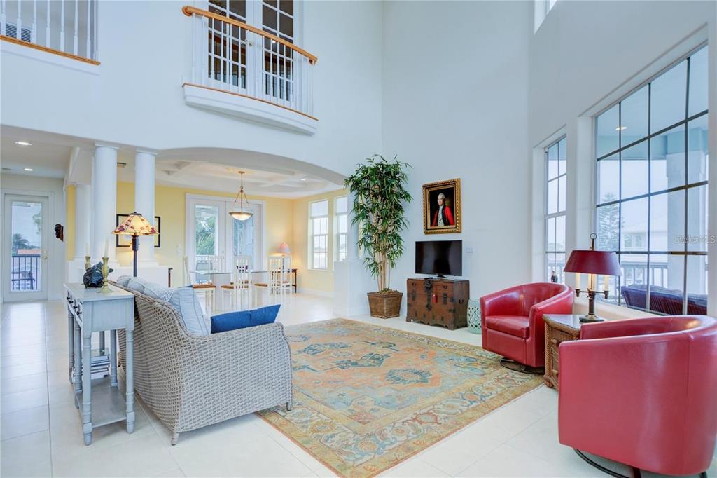 7352 Gulf Way Hudson, FL 34667 - Photo 5 of 69 a living room with furniture or couch and a dining table