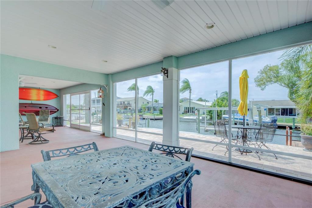 7352 Gulf Way Hudson, FL 34667 - Photo 54 of 69 a view of a living room and dining room