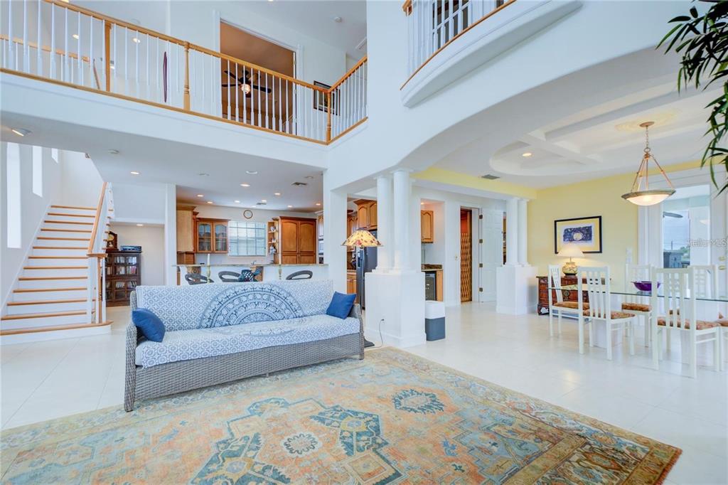 7352 Gulf Way Hudson, FL 34667 - Photo 6 of 69 a living room with furniture and a wooden floor