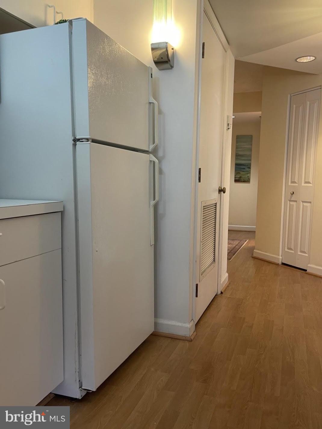 601 Pennsylvania Avenue Northwest, Unit 710 Washington, DC 20004 - Photo 11 of 20 a view of empty room with closet and wooden floor