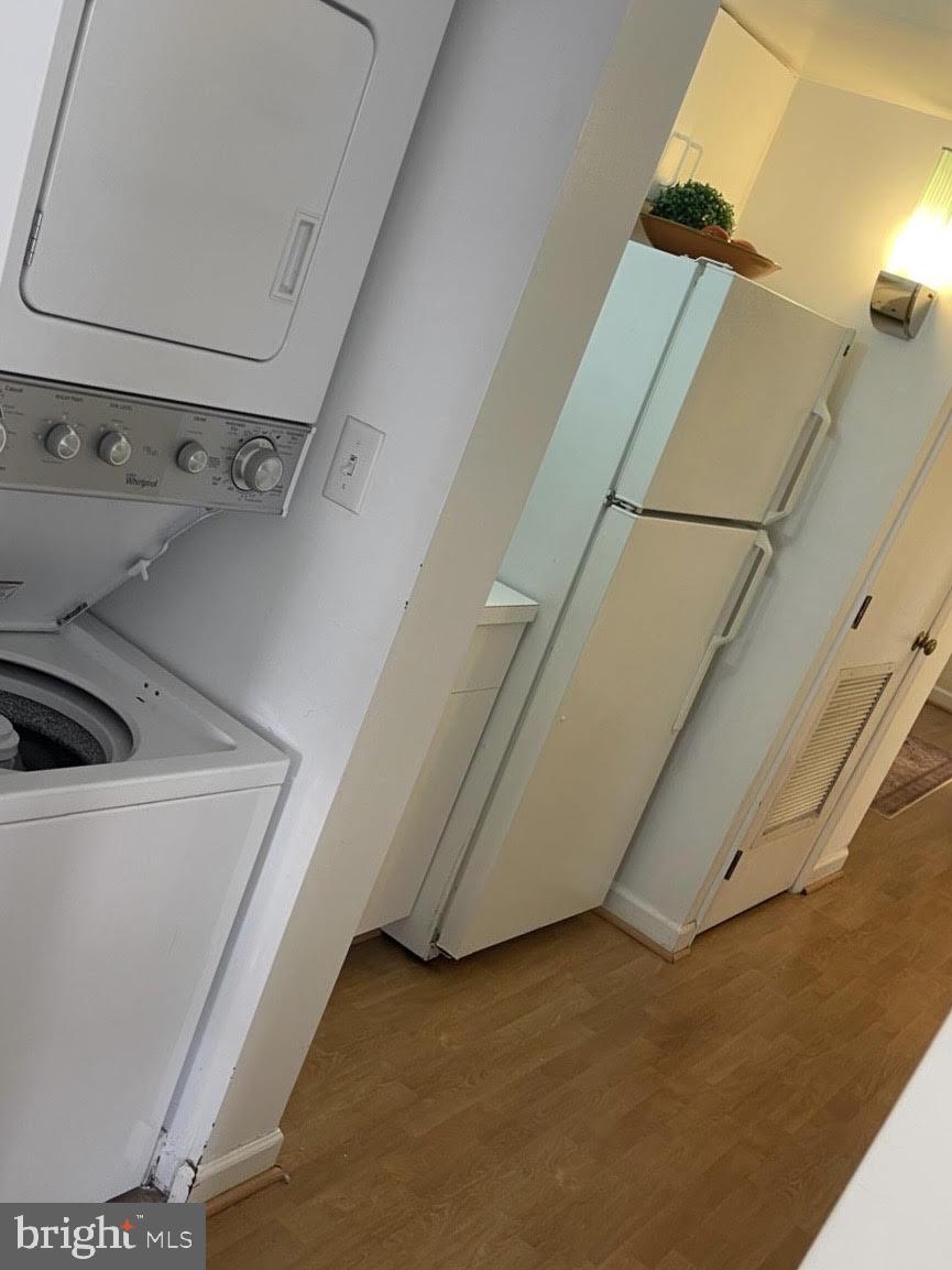601 Pennsylvania Avenue Northwest, Unit 710 Washington, DC 20004 - Photo 15 of 20 a view of storage and utility room with washer and dryer