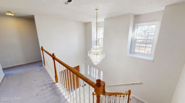 a view of entryway with stairs
