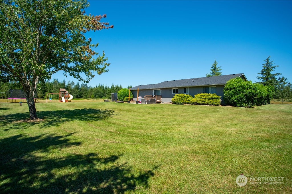 250 Classe Road Toledo, WA 98591 - Photo 19 of 25 a view of yard with swimming pool and green space