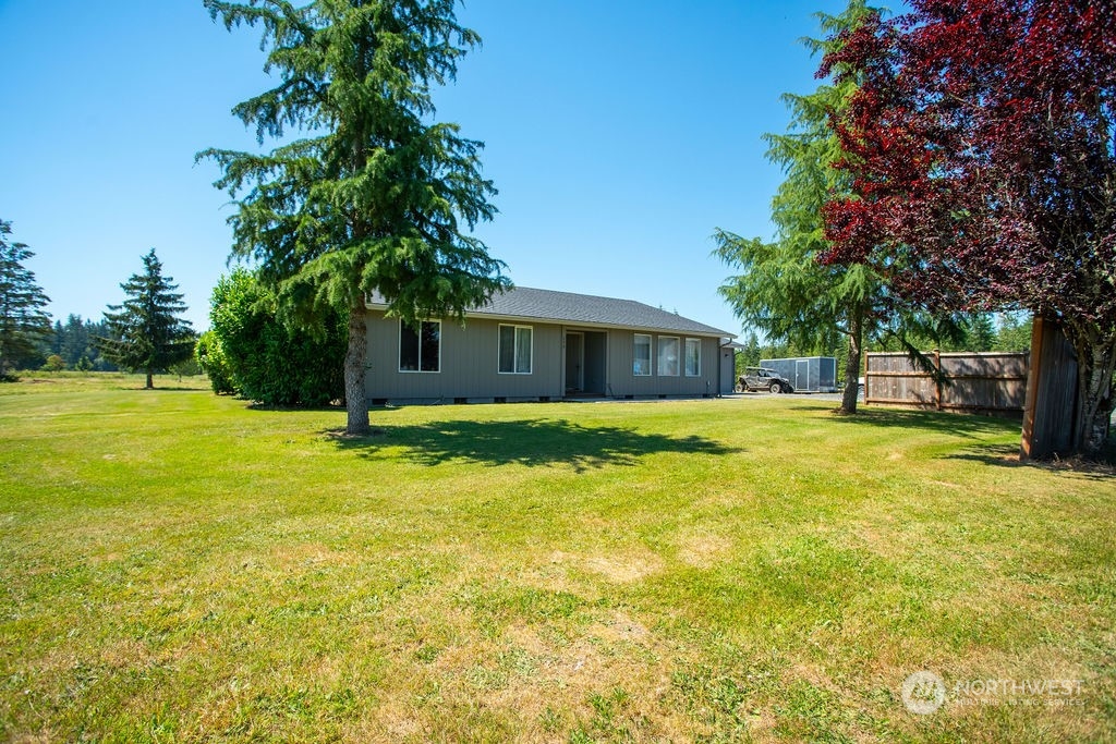 250 Classe Road Toledo, WA 98591 - Photo 20 of 25 a house view with swimming pool in front of it