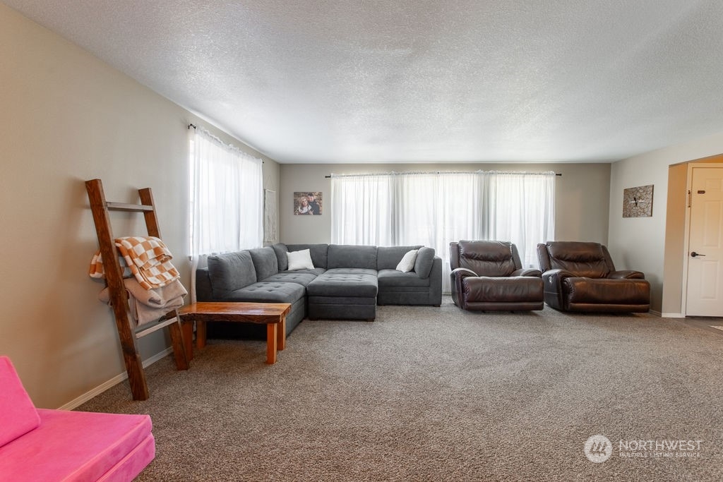 250 Classe Road Toledo, WA 98591 - Photo 5 of 25 a living room with furniture and a window