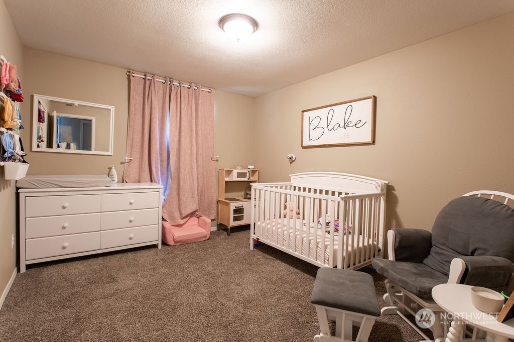 250 Classe Road Toledo, WA 98591 - Photo 10 of 25 a bedroom with a bed and a window