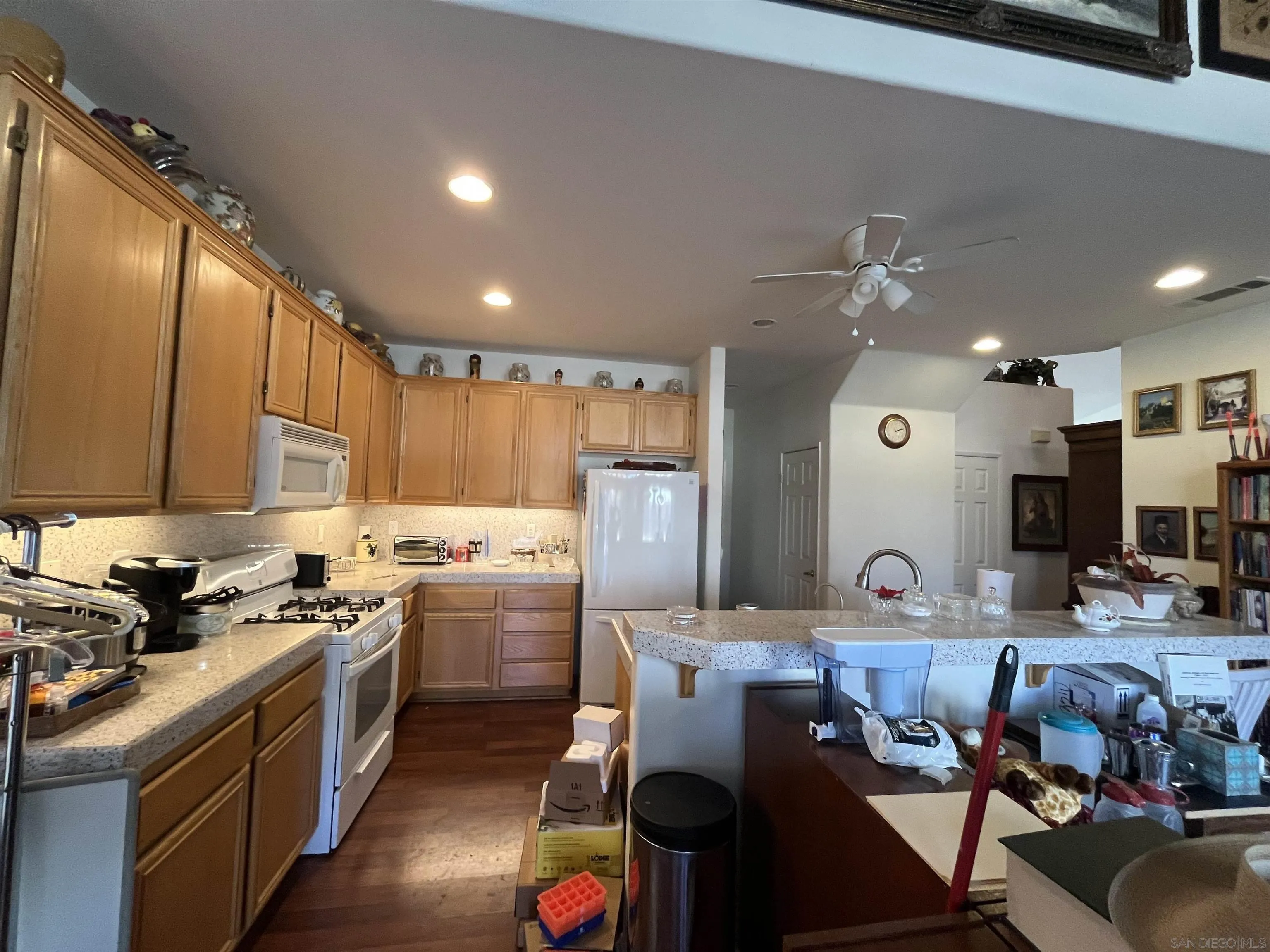 2723 Hazy Way Banning, CA 92220 - Photo 28 of 48 a kitchen with a sink appliances cabinets and furniture