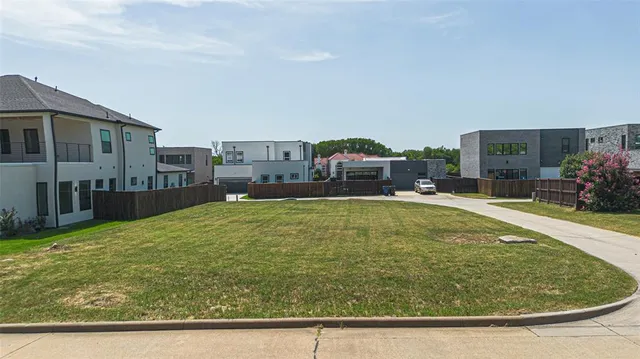 a swimming pool with outdoor seating and yard