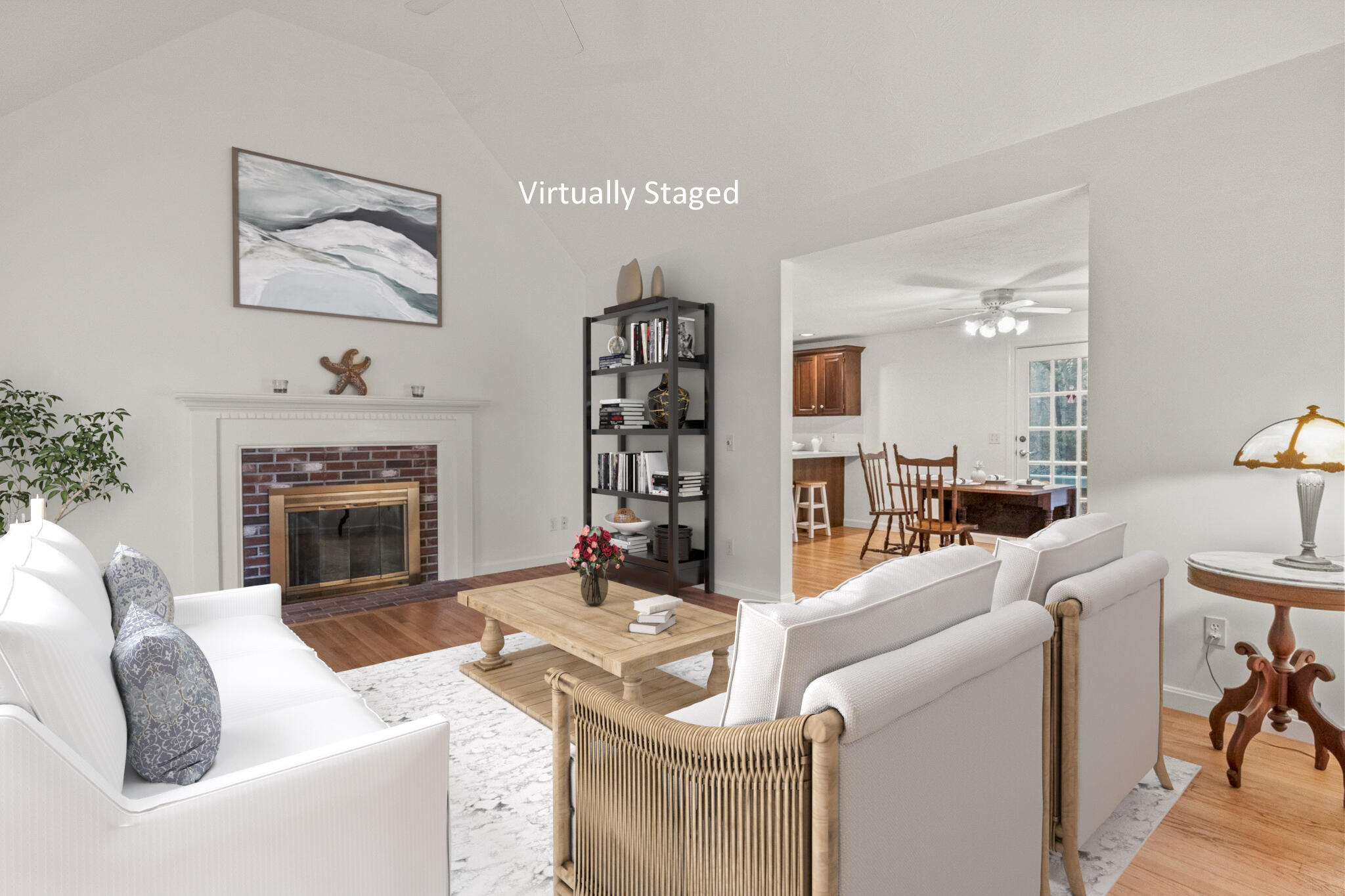 52 Goose Point Road Centerville, MA 02601 - Photo 15 of 71 a living room with furniture and a fireplace