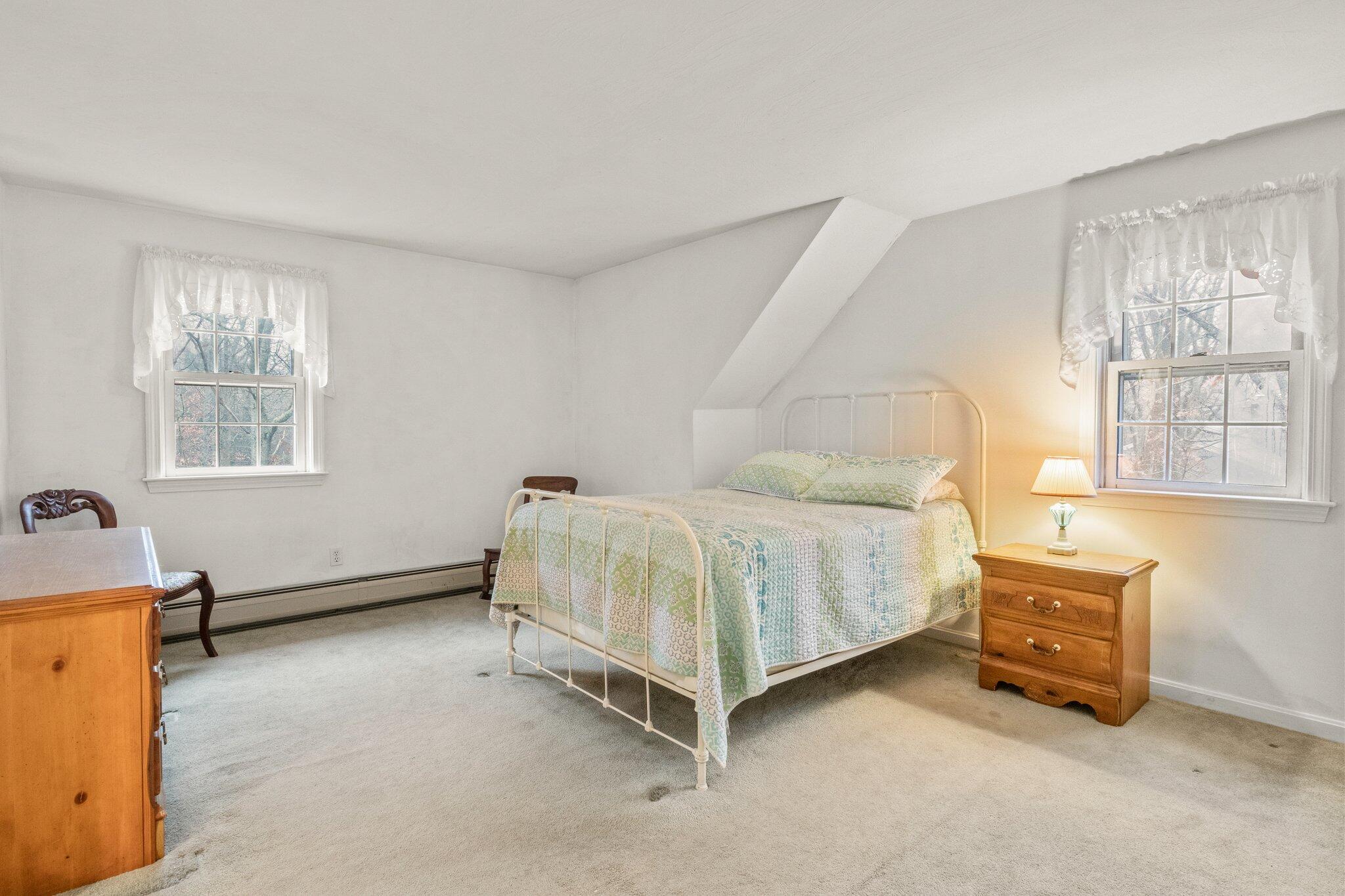 52 Goose Point Road Centerville, MA 02601 - Photo 33 of 71 a bed sitting in a room next to a window