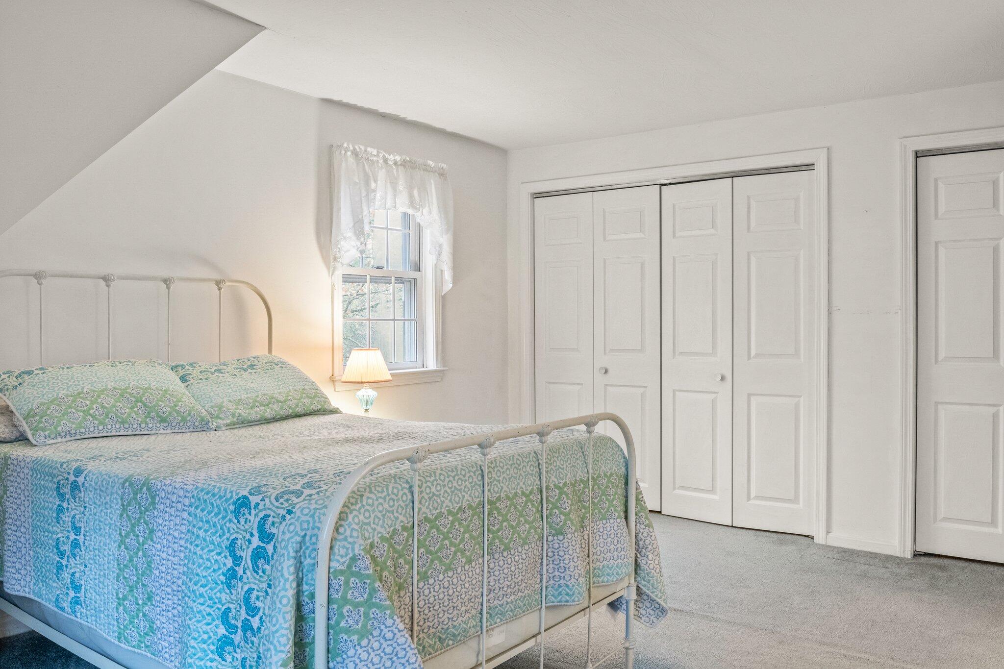 52 Goose Point Road Centerville, MA 02601 - Photo 35 of 71 a bedroom with a bed and a window