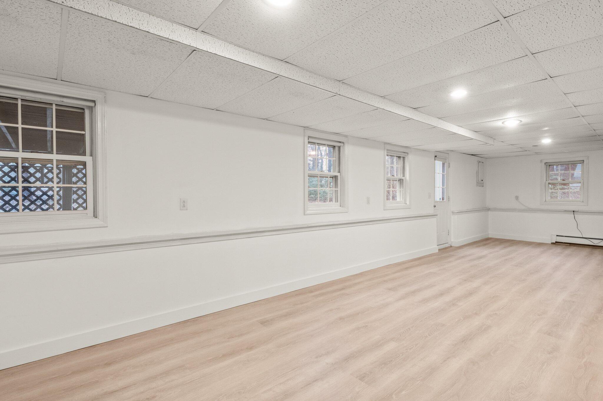 52 Goose Point Road Centerville, MA 02601 - Photo 49 of 71 an empty room with windows