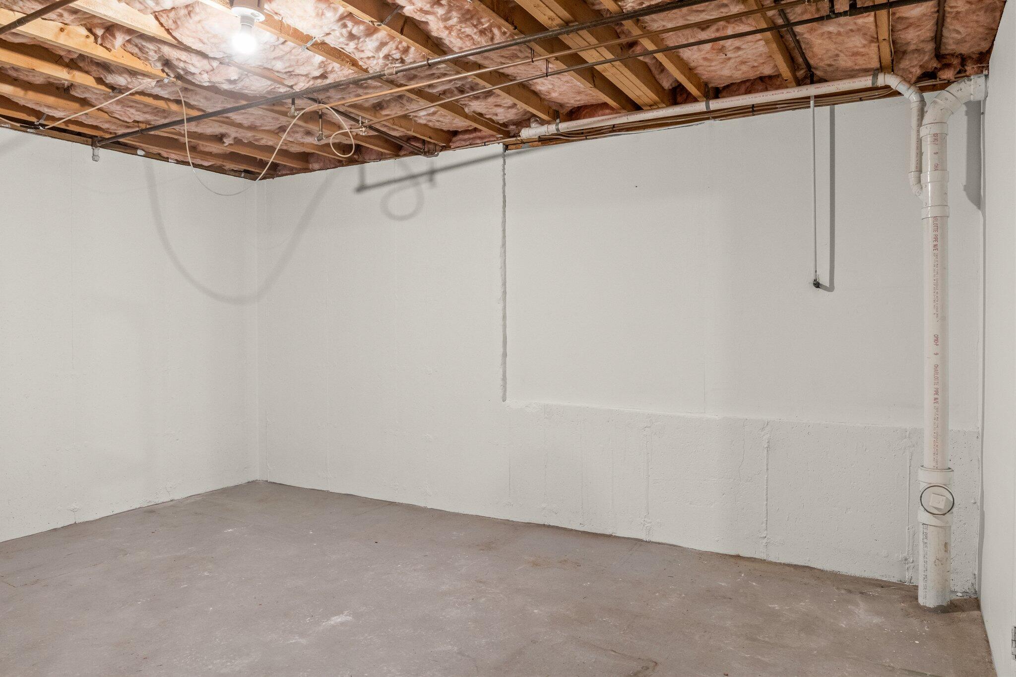 52 Goose Point Road Centerville, MA 02601 - Photo 52 of 71 a view of a room with racks on the wall