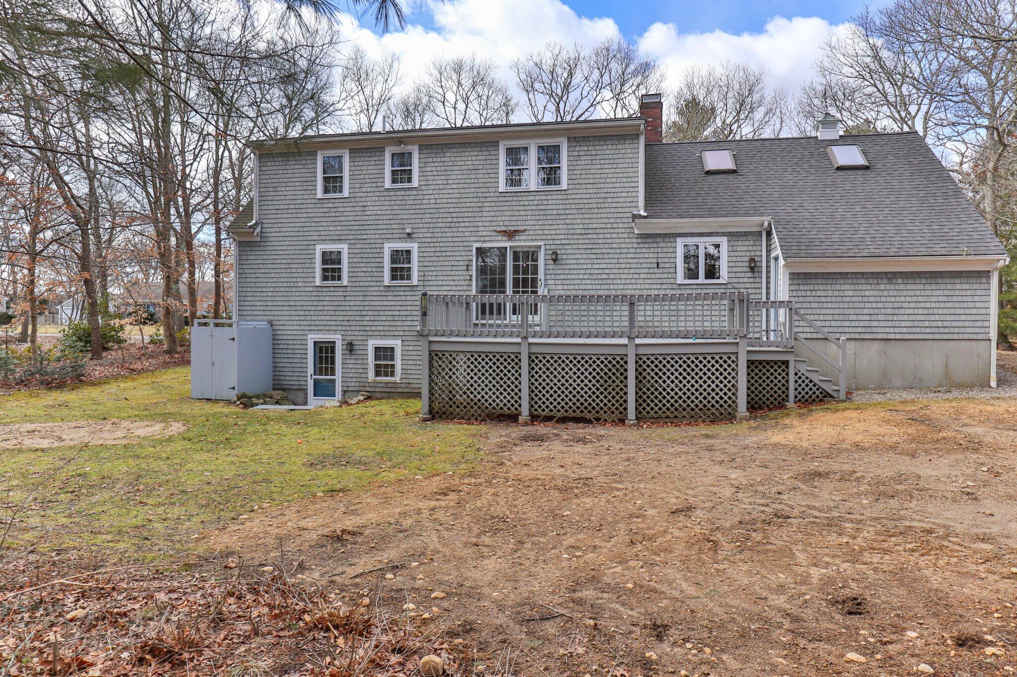 52 Goose Point Road Centerville, MA 02601 - Photo 57 of 71 a view of an house with backyard space and balcony
