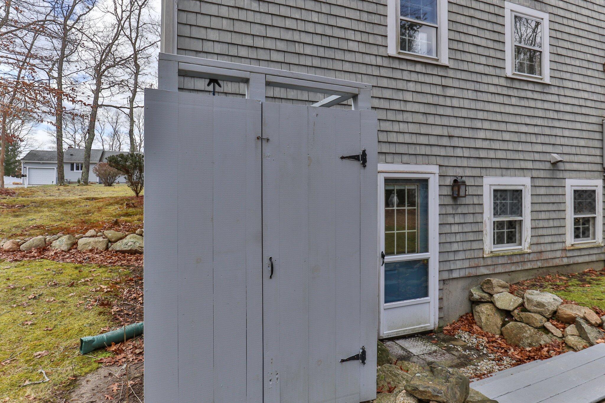 52 Goose Point Road Centerville, MA 02601 - Photo 61 of 71 a view of a house with a yard
