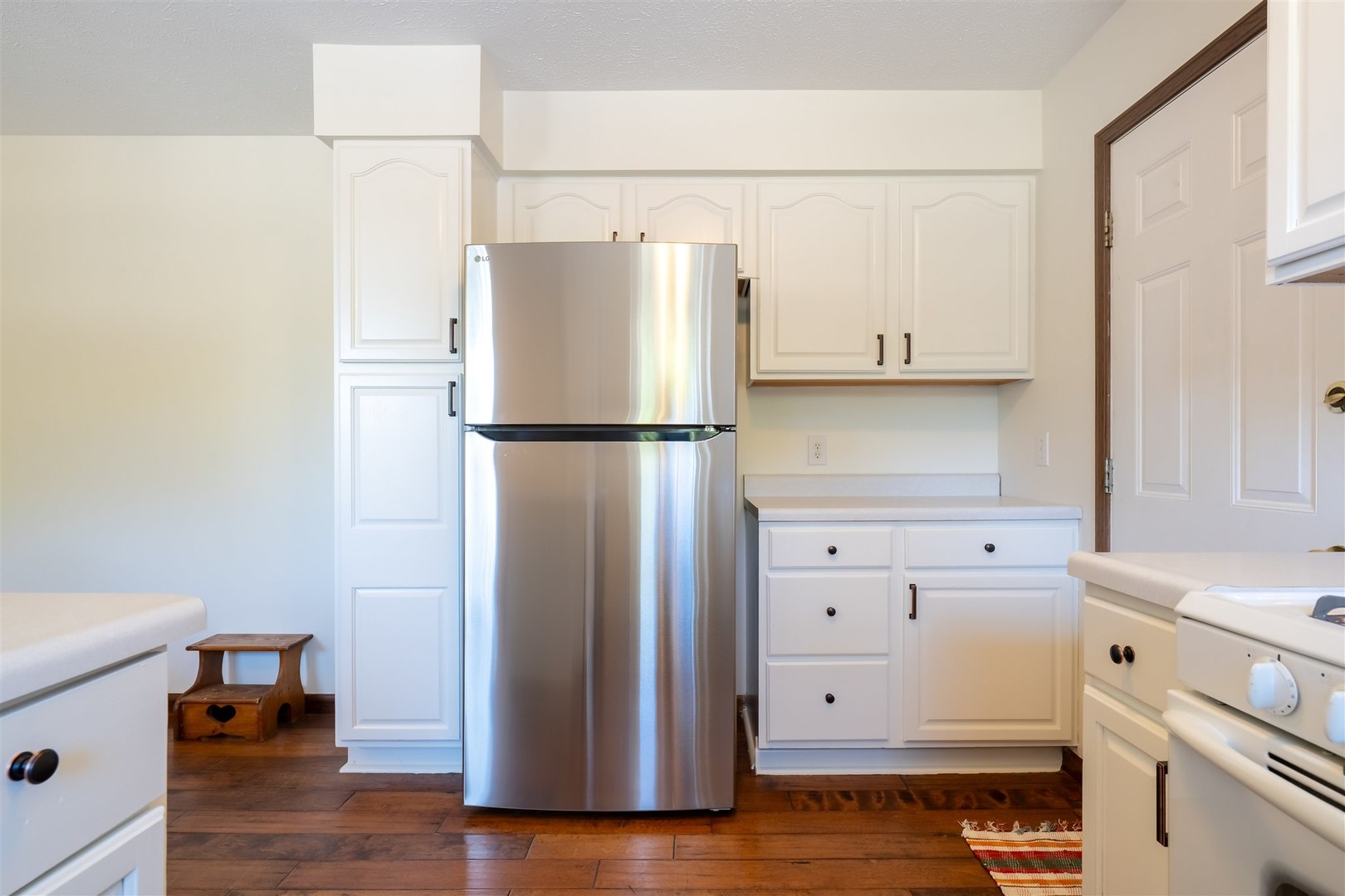 4397 North 3200 East Road Arrowsmith, IL 61722 - Photo 11 of 33 a white refrigerator freezer sitting in a kitchen