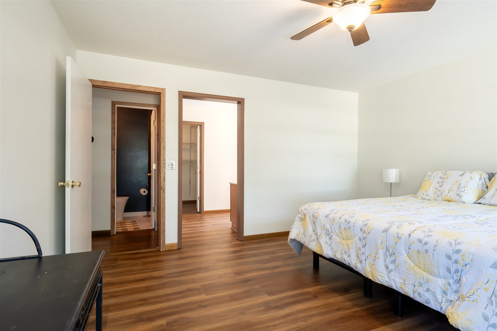 4397 North 3200 East Road Arrowsmith, IL 61722 - Photo 16 of 33 a bedroom with a bed and wooden floor