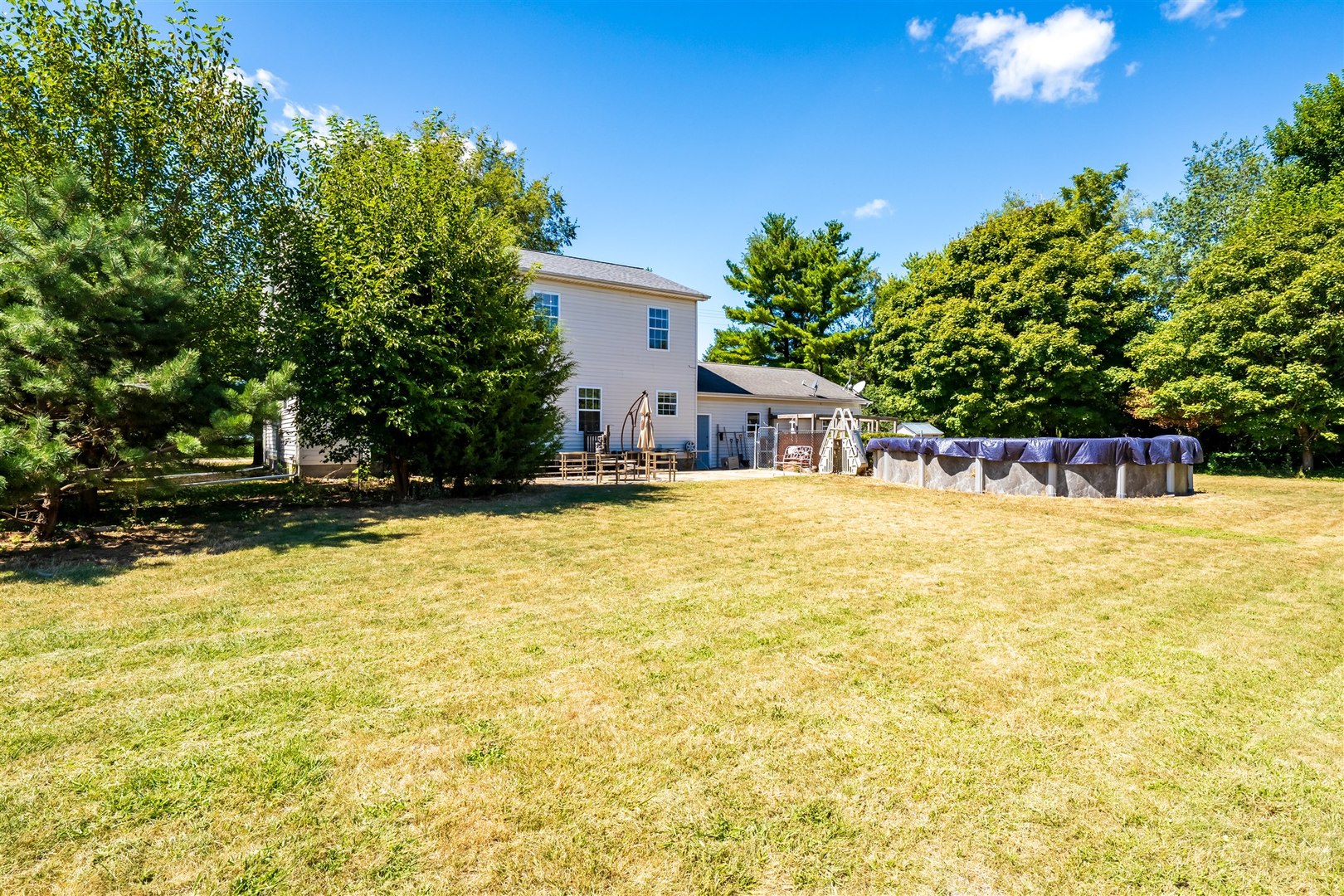 4397 North 3200 East Road Arrowsmith, IL 61722 - Photo 33 of 33 a view of swimming pool with outdoor seating and yard