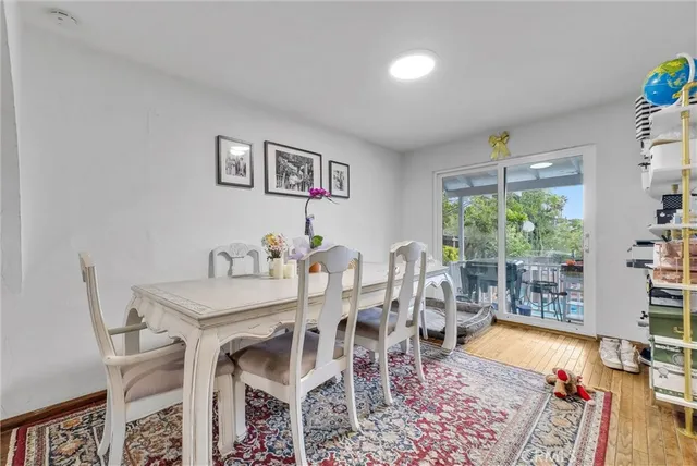 a kitchen with cabinets and window