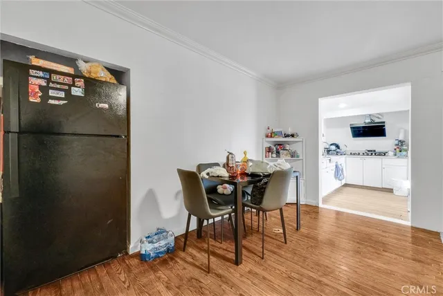 a bedroom with a bed and dresser