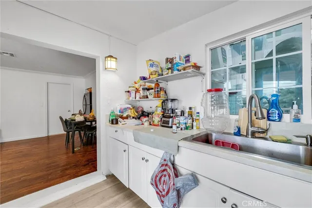 a bedroom with a large bed and a walk in closet