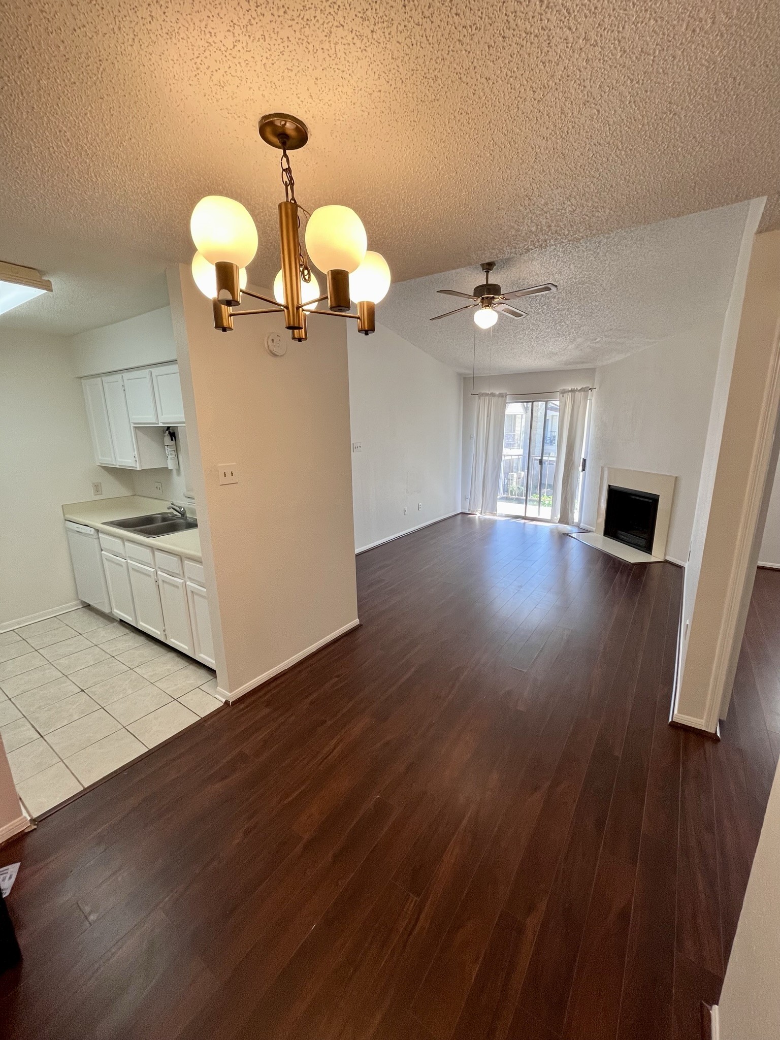 2120 El Paseo Street, Unit 1912 Houston, TX 77054 - Photo 8 of 34 a view of a kitchen with wooden floor