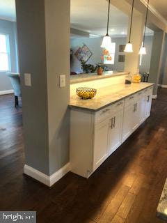 3713 Chatham Road Baltimore, MD 21215 - Photo 13 of 28 a bathroom with a granite countertop sink and a mirror