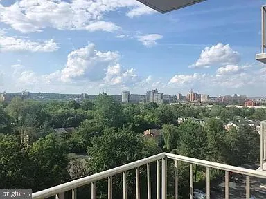 a view of a city from a balcony