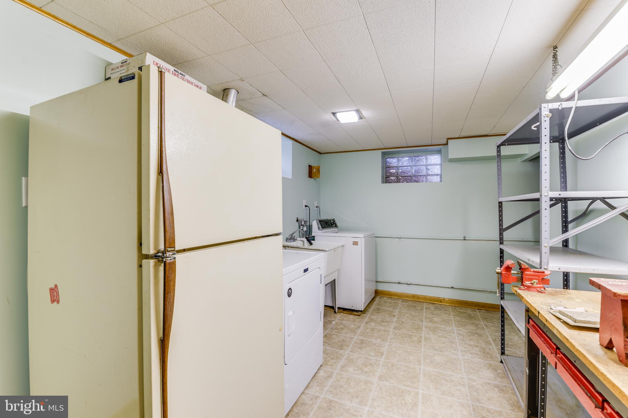 1528 Neighbors Avenue Rosedale, MD 21237 - Photo 31 of 39 Utility Area with Work Bench