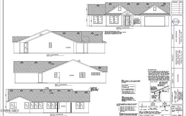 a view of a hallway with a white walls and a window