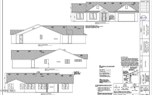 a view of a hallway with a white walls and a window