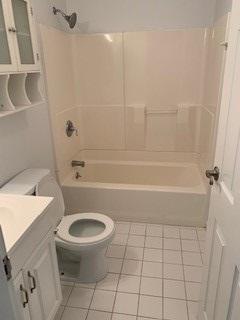 1431 Iyannough Road, Unit 7U Centerville, MA 02632 - Photo 8 of 11 a bathroom with a toilet and a shower