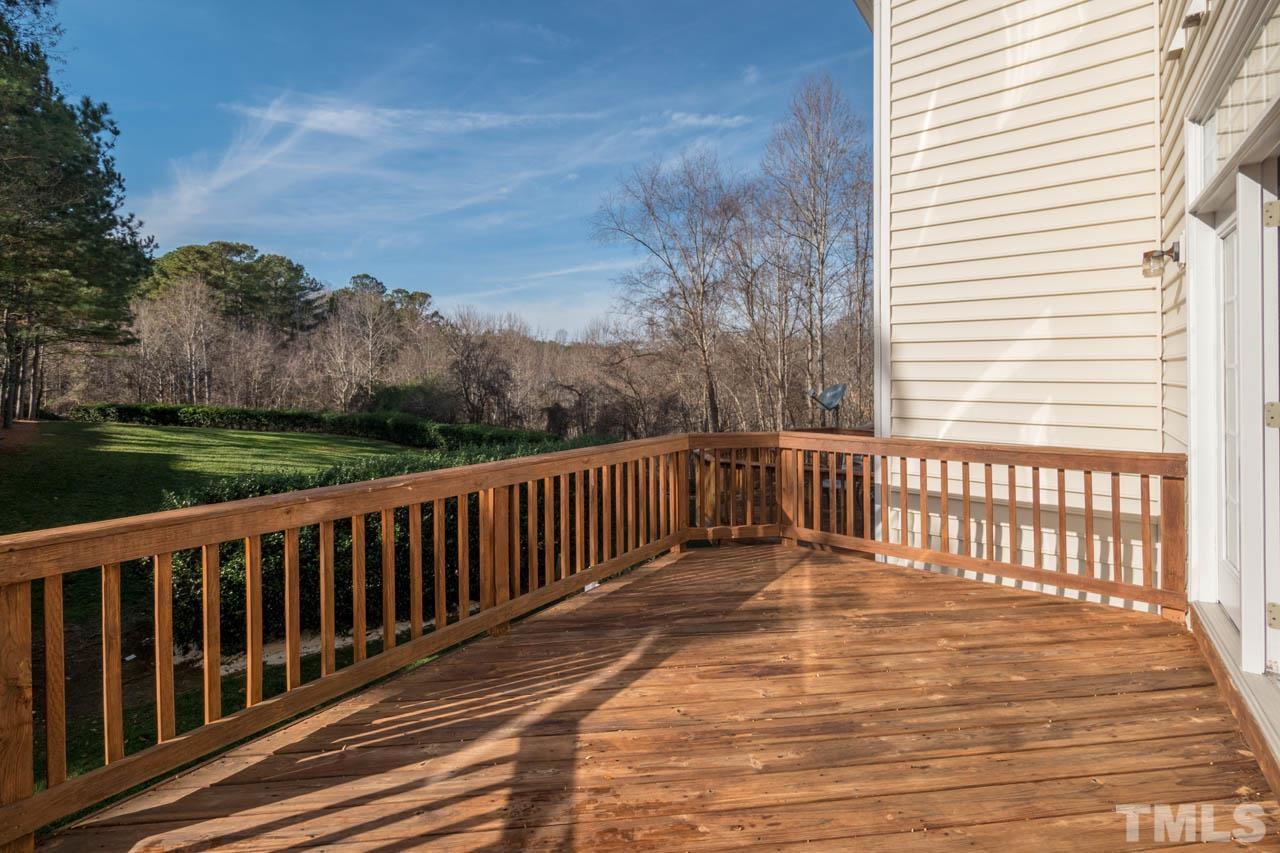 6949 Middleboro Drive Raleigh, NC 27612 - Photo 23 of 35 a view of a wooden roof deck