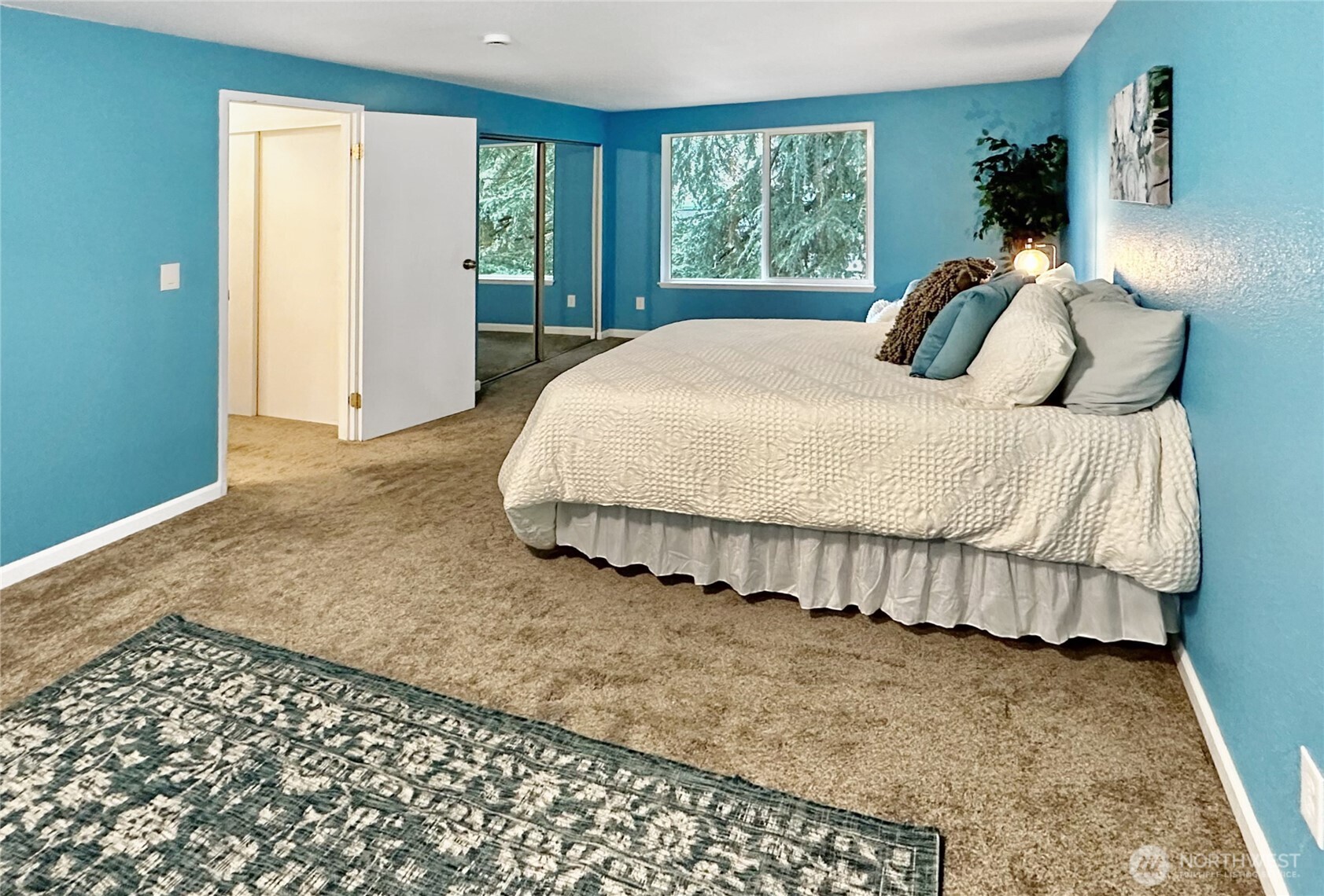 7910 Husky Way Southeast Lacey, WA 98503 - Photo 16 of 36 a bedroom with a bed and window