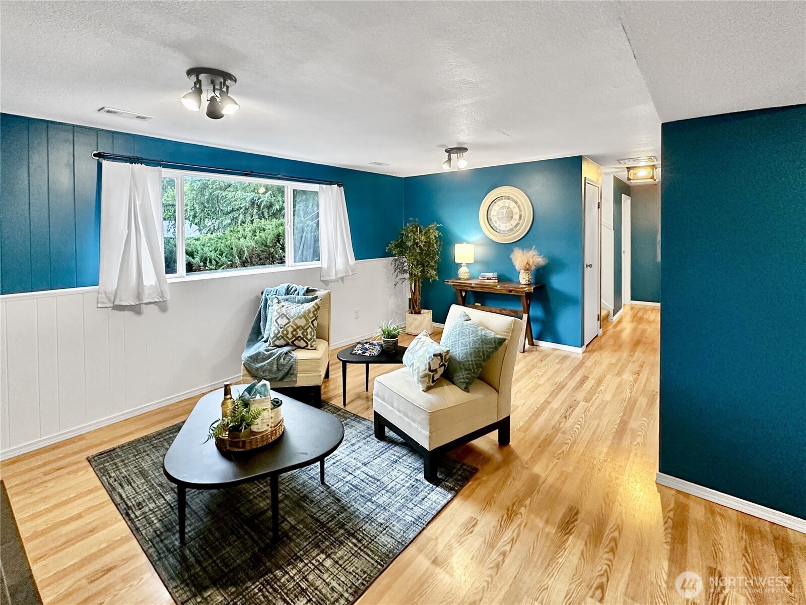7910 Husky Way Southeast Lacey, WA 98503 - Photo 18 of 36 a living room with furniture and a table