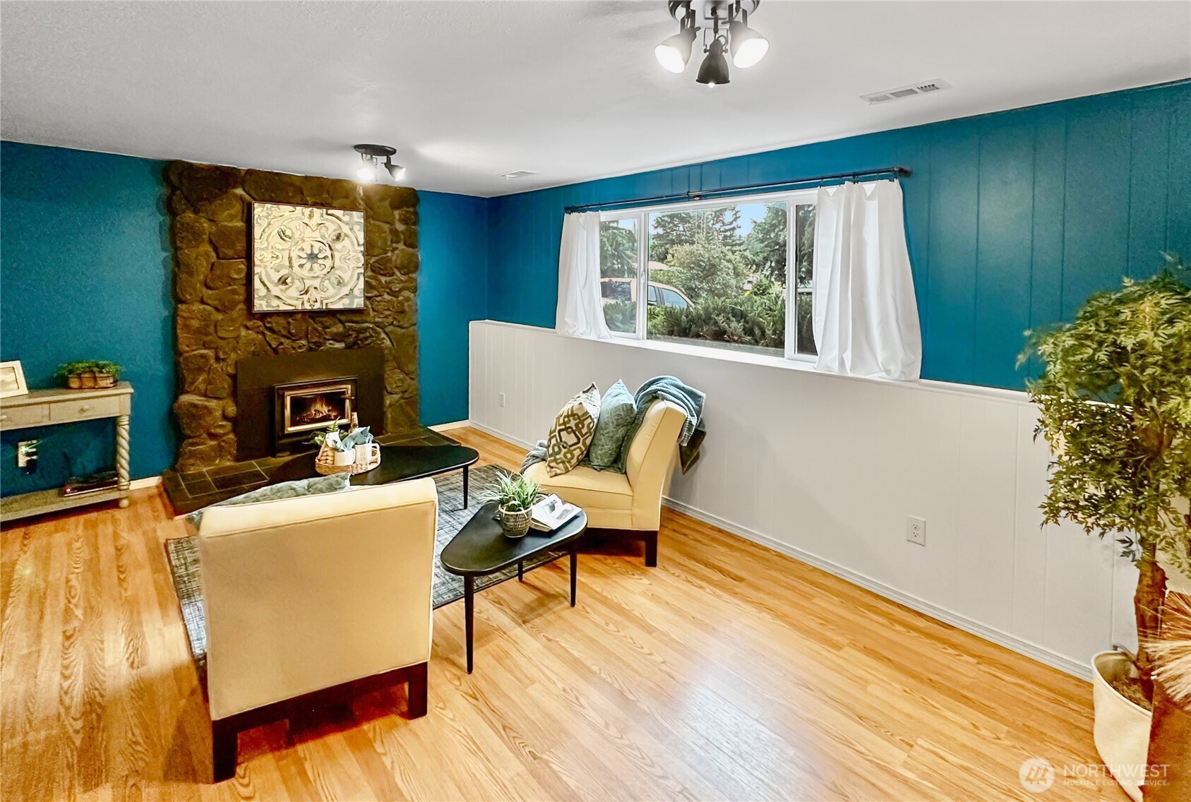 7910 Husky Way Southeast Lacey, WA 98503 - Photo 20 of 36 a living room with furniture and a window