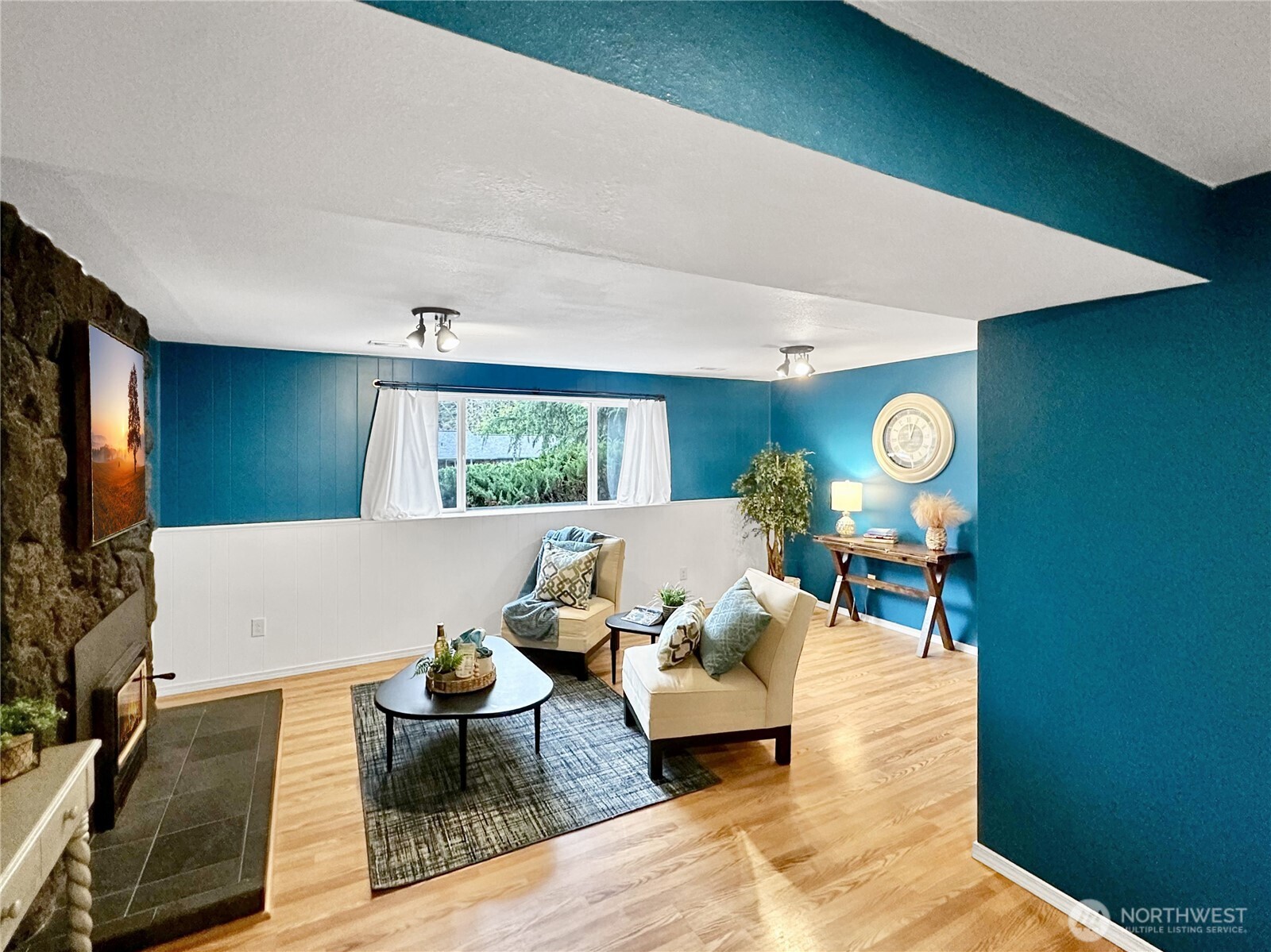 7910 Husky Way Southeast Lacey, WA 98503 - Photo 21 of 36 a living room with furniture and a flat screen tv