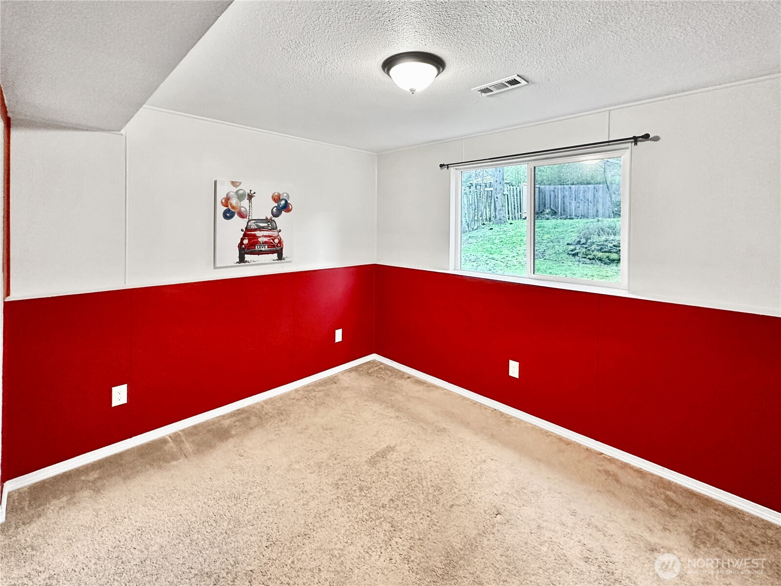 7910 Husky Way Southeast Lacey, WA 98503 - Photo 22 of 36 a view of empty room with large window