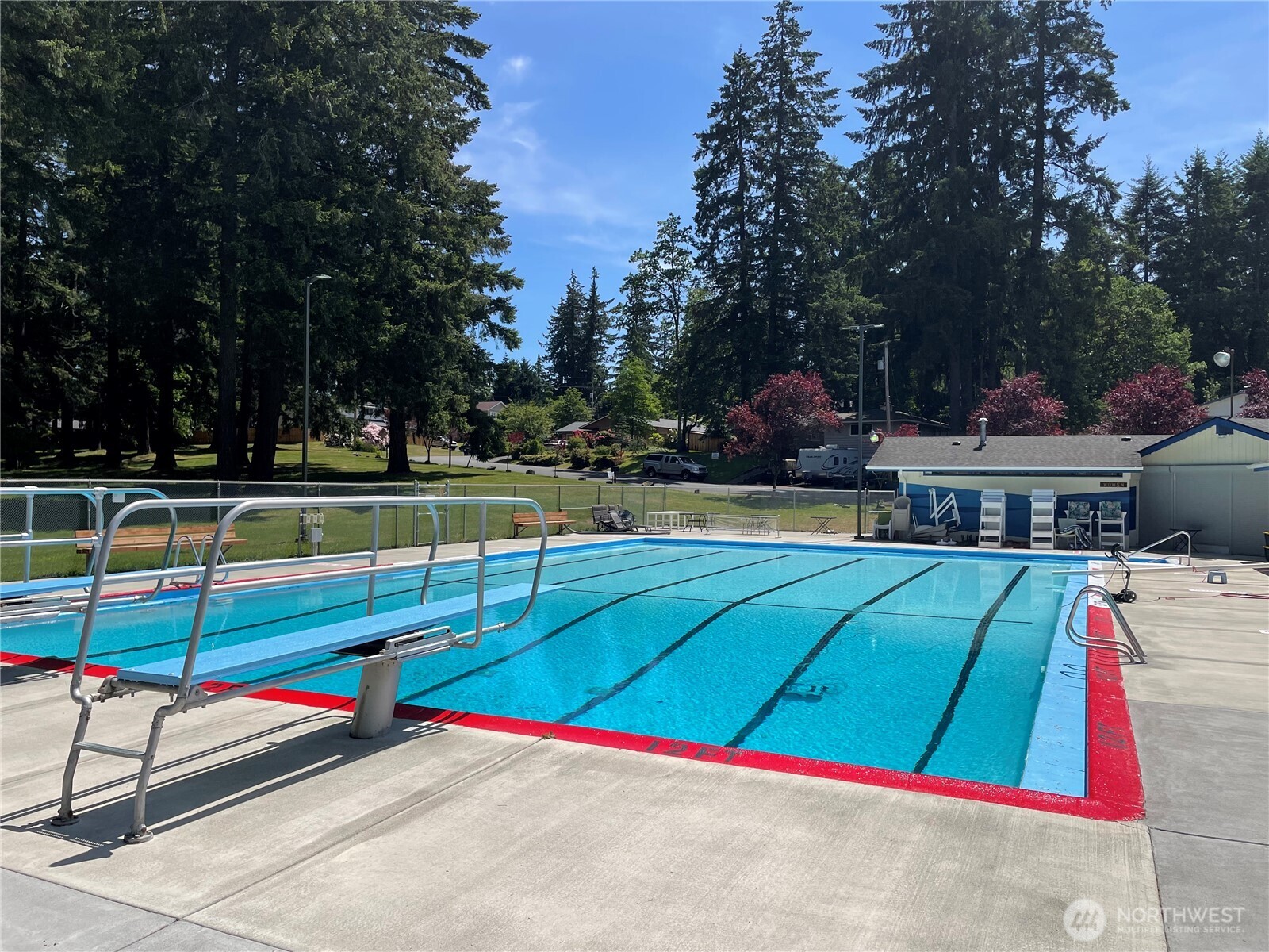 7910 Husky Way Southeast Lacey, WA 98503 - Photo 36 of 36 a view of tennis ground with large trees