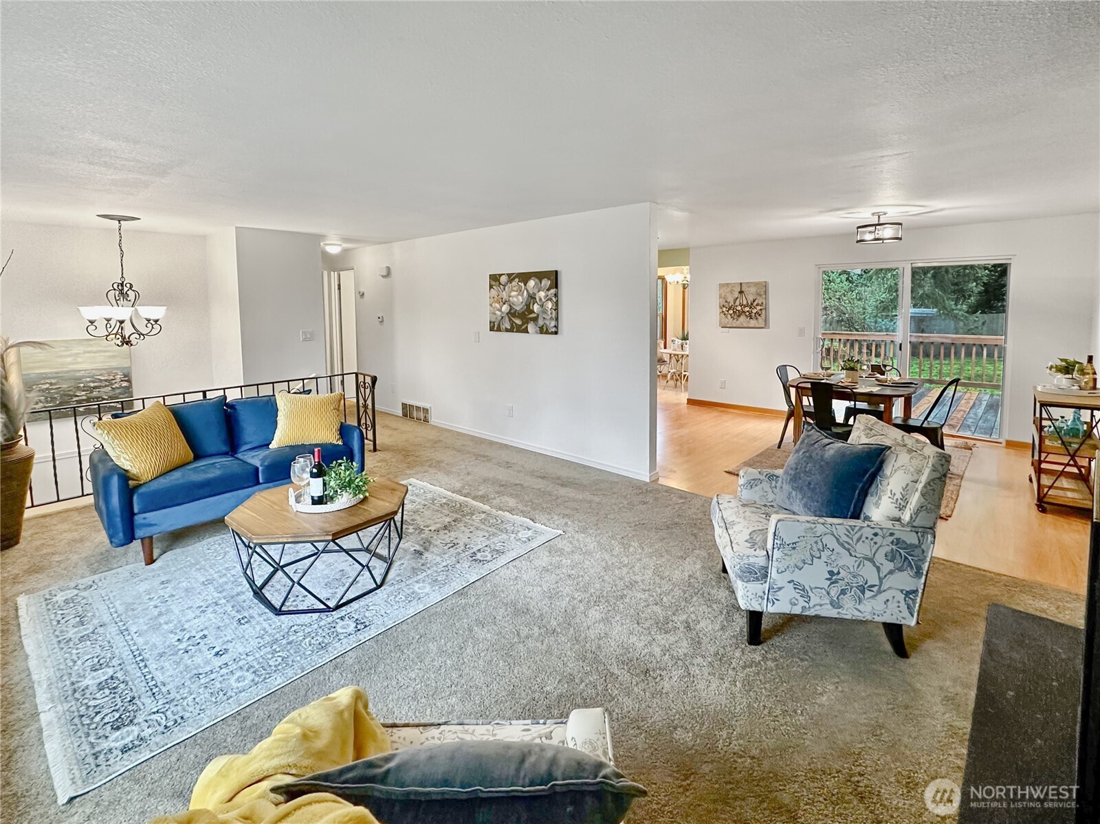 7910 Husky Way Southeast Lacey, WA 98503 - Photo 4 of 36 a living room with furniture and a large window