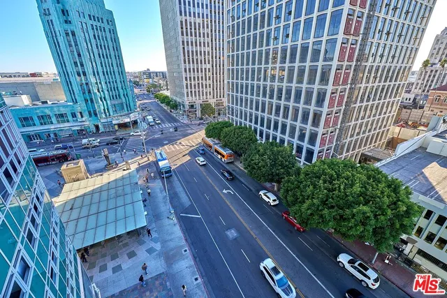 a view of a balcony with wooden floor
