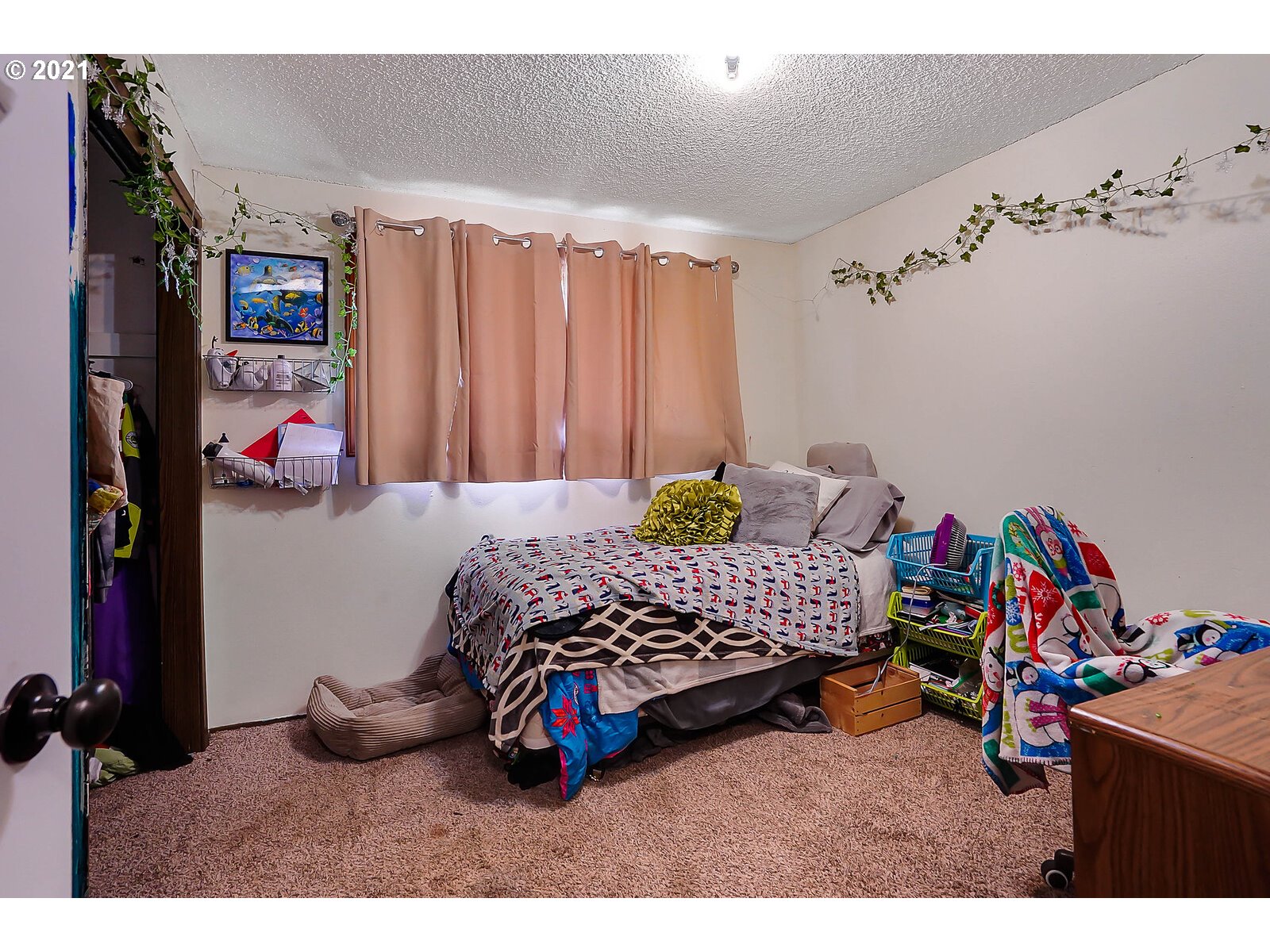 15145 Guthrie Road Dallas, OR 97338 - Photo 18 of 32 a bedroom with a bed and a window