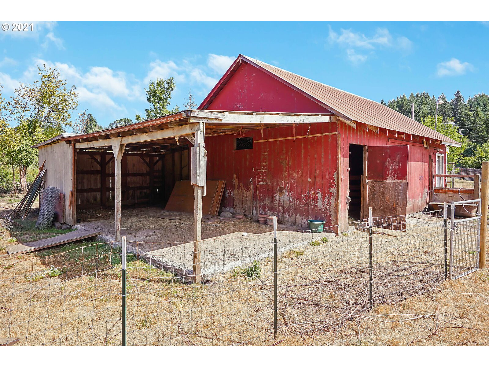 15145 Guthrie Road Dallas, OR 97338 - Photo 22 of 32 a view of a backyard with a garden and deck