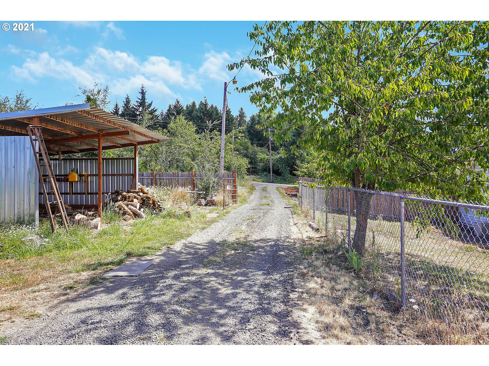 15145 Guthrie Road Dallas, OR 97338 - Photo 23 of 32 a view of a house with a yard